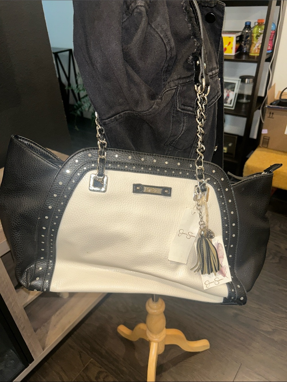 Jessica Simpson Black and Cream Studded Tote with Tassel Charm